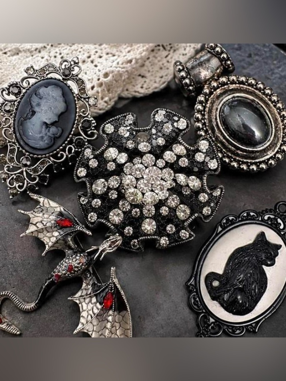 Set of 4 brooches an a scarf clip dark goth